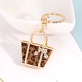 Leopard print mini handbag keychain with gold plating and sparkling rhinestones - Leopard Print Handbag Style (CHY-3942)
