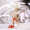 Golden high heel keychain with red enamel stars and sparkling rhinestones for bags - Red