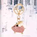 Portachiavi maialino volante con strass rosa, finitura dorata e ali smaltate - Rosa