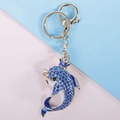 Porte-clés dauphin en strass bleus avec couronne dorée pour décoration de sac à main - Bleu