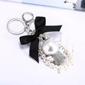 Elegant angel pearl keychain with black ribbon bow and sparkling rhinestone crown - Angel Wings - Silver