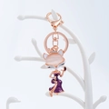 Elegant fox pendant keychain with purple dress and pink stone head in rose gold finish - Purple