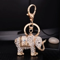 Sparkling elephant keychain with gold plating and rhinestones for handbags and purses - White (5276)