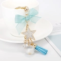 Llavero de lazo a rayas azules con perla y estrella para bolsos de mujer - Azul