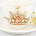 Elegant gold crown keychain with pink pear-shaped crystal and sparkling rhinestones - Champagne