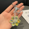 Handheld iridescent crystal flower keychain with aurora finish and silver metal ring - White
