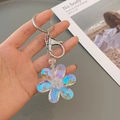 Chic five-petal crystal flower keychain with iridescent AB coating and silver metal clasp - White