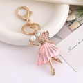Ballerina Fee Schlüsselanhänger mit rosa Emaille und Kristallen in Goldoptik - Mädchen Rosa