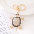 Portachiavi a forma di tartaruga dorata con strass colorati e cristalli luccicanti - Smalto Oro e Nero