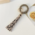 Leopard print spiral wristband keychain with matching PU leather tassel and gold ring - Leopard Print