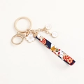 Porte-clés japonais avec ruban floral bleu marine et breloque sakura en émail blanc - Style Shiba Inu Bleu Foncé (2 Lettres)
