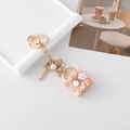 Pink tweed bag keychain with golden key, white pearls and delicate fabric flowers - Orange