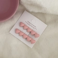 Set of two pink matte heart hair clips on white card with decorative plush background - Pink Heart