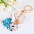 Squisito portachiavi a forma di coniglio dorato con strass blu e bianchi - Blu lago-4618