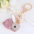 Simpatico portachiavi a forma di coniglio con strass rosa e bianchi e finitura dorata - Rosa chiaro-4618