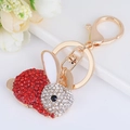 Portachiavi con coniglio carino con strass rossi e trasparenti su anello in metallo dorato - Rosso brillante-4618