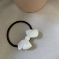 Detail shot of white resin bow hair tie with durable black elastic rubber band - White with Bowknot