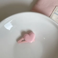 Detailed macro of a matte pink heart-shaped hair clip inside a white ceramic bowl - 5# Pink Hair Clip Pink Heart