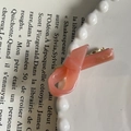 Detailed macro view of pink resin bow hair clip with gold Handmade lettering accent - Pure Pink