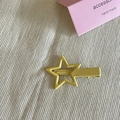 Close-up of a bright yellow star-shaped metal hair clip on a pink packaging card - Star Duckbill Clip (3#) / Yellow