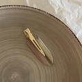 Close-up of a premium tortoiseshell resin hair clip on a minimalist ceramic plate - 2# Purple Textured No-Trace Clip