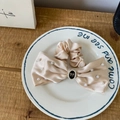 Elegant champagne satin scrunchie with white pearl accents and vintage center detail - Champagne Pearl Bow