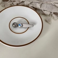 Fermaglio per capelli argento opaco con perla di metallo grigio e strass cangiante - Stile Perla Cristallo Grigio