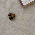 Mini amber acetate hair claw clip with tortoise shell pattern on linen background - Dark Leopard Print (Convex)