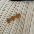 Detail showing three heart-shaped acetate hair clips with Barrette La France text - Ginger Yellow Three Hearts (12#)