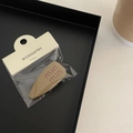 Matte khaki teardrop duckbill hair clip with min min text and packaging cards - Coffee