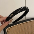 Close-up of black tweed headband with gold metal plate engraved with Love is Forever - Black Plaid (1#) / Black and White Plaid