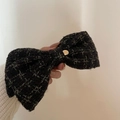 French tweed bow hair clip with gold metal badge and Believe In Yourself text - Black