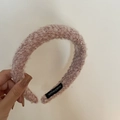 Detail showing pink bouclé texture headband with woven handmade label inside - Pink