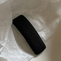 Macro view of twilled texture on a black rectangular hair clip against white paper - 1# Black Stripe
