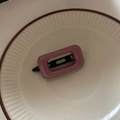 Detail of a dusty pink square hair clip on a vintage striped ceramic tray - Rectangle Style / Purple