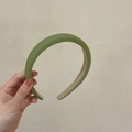 Detail showing the matte avocado green faux leather texture and beige lining of the headband - Headband (1#) / 2cm Wide / Grass Green