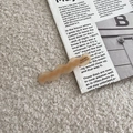 Detailed view of champagne acetate hair claw with marble texture and French lettering - 10# Beige Gingham Wave Duckbill Clip