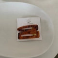 Detail of tortoise shell acetate hair clips with duckbill design on a vintage display card - Champagne Tortoiseshell