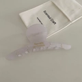Macro shot of lavender acetate hair claw with gold lettering and rhinestone accents - Silver White Long Strip
