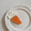 Pair of orange jelly drop hair clips displayed on a white textured ceramic dish - Orange Matte / Orange