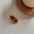 Cute cream-colored floral hair clip with a brown oval base and small orange flower detail - Caramel Flower (Khaki Clip)