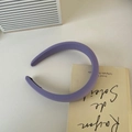 Detail of light purple sponge headband featuring a minimalist matte fabric texture - Purple