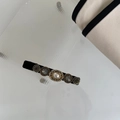 Detail of vintage velvet hair clip with elegant pearls and crystal metal relief - Four Gray Rhinestone Pearl Duckbill Clip