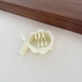 Macro detail of cream acrylic hair claw clip with curved petal edges and secure grip teeth - Three Round Curved Style / Off White