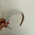 Detail view of green plaid sponge headband with non-slip lining and thick padded design - Green Plaid