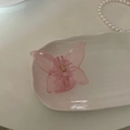 Pink translucent butterfly acrylic hair claw clip for women on a white jewelry tray - Pink Butterfly