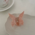 Pince à cheveux papillon en acétate rose marbré avec ressort sur plateau blanc - 7.5cm / Papillon orange