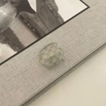 Detail of blue and beige checkered acetate hair claw clip with metal spring mechanism - Hollow Arch Style / Small / Blue White Checkered