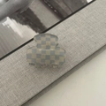Detailed view of large acetate hair claw with blue and white checkerboard pattern texture - Square Style / Small / Blue White Checkered