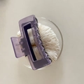 Detailed top view of a large translucent purple resin hair claw clip on a white plate - Purple Spliced Square